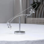 El Pescador, escultura de equilibrio en acero inoxidable - foto 4