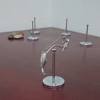El Pescador | Escultura de equilibrio en acero inoxidable